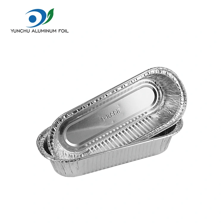 Ovaalne õhu praepann küpsetab hõbedase alumiiniumfooliumi anumaid